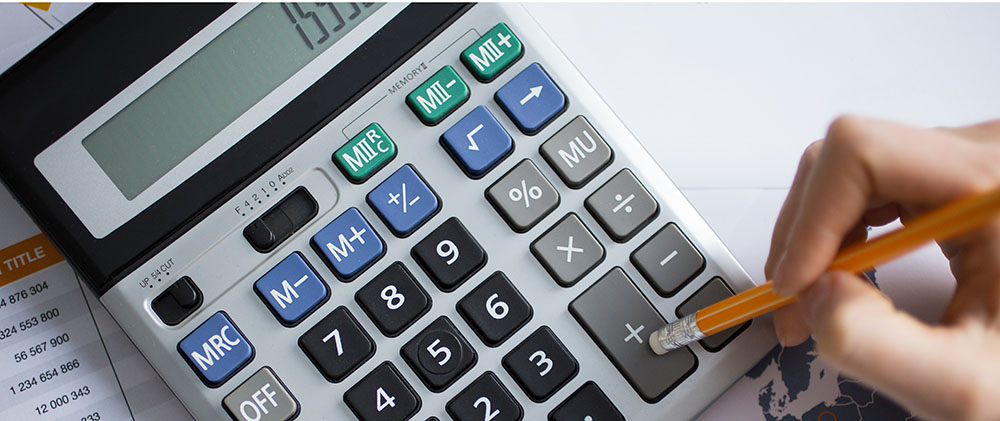 Cropped View of Man Hand Working With Calculator